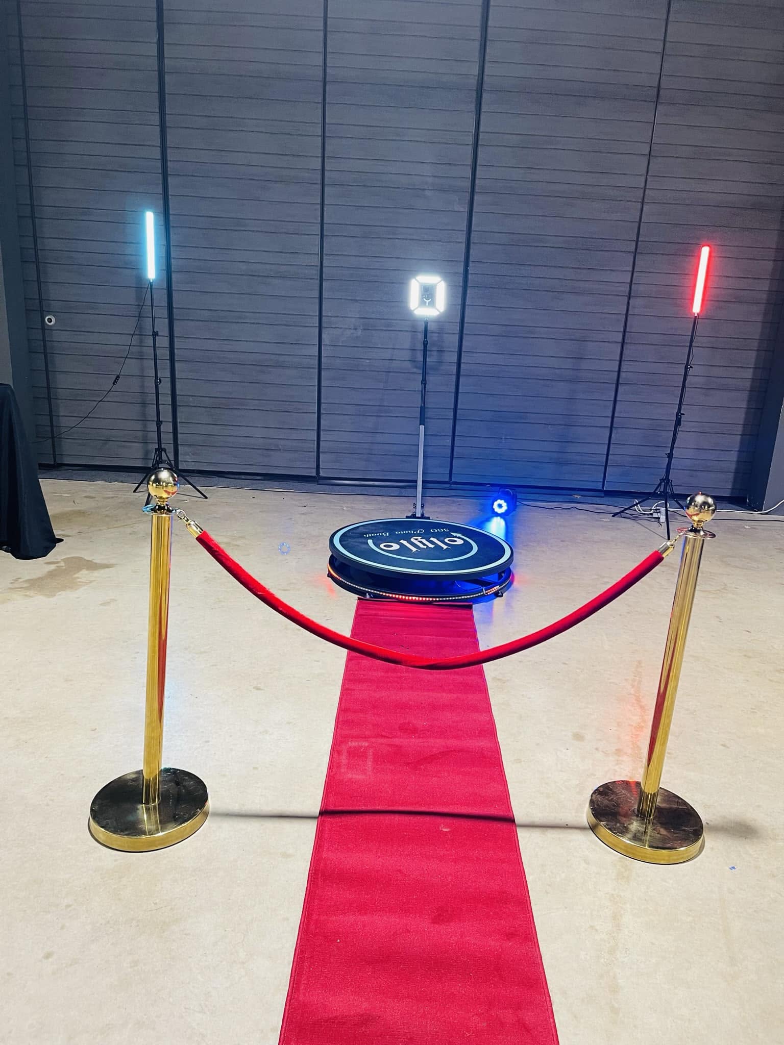 John's 360 video booth setup with red carpet and lighting