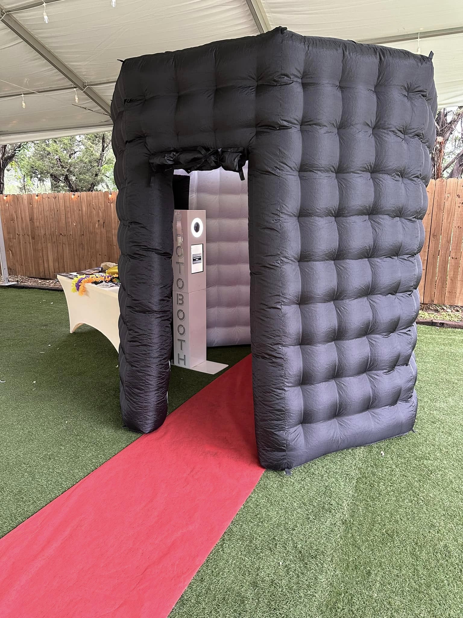 Enclosed printable photo booth with red carpet